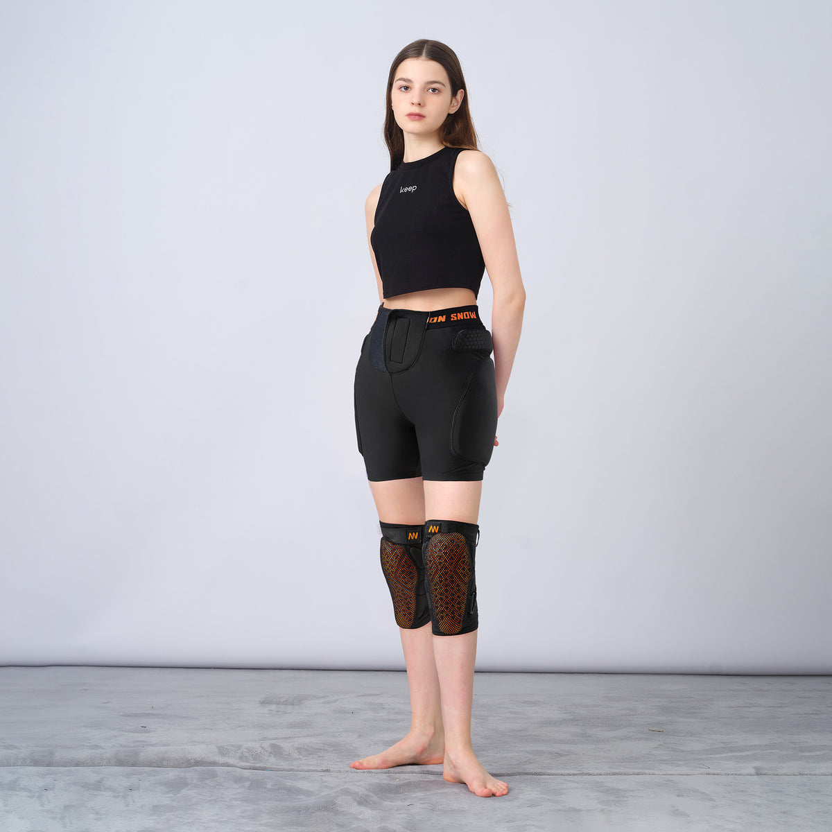 NANEND Hip, knee, and wrist support ski suit - side view