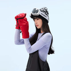 Model wearing Cinnabar Red NANEND PrimaLoft® Professional waterproof ski mittens, viewed from the side (Cinnabar Red)
